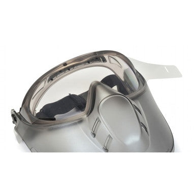 Close-up of Pyramex Safety Capstone Goggles with tear-off protective visor films (6/pack), featuring a gray sturdy frame, clear lens covers, and adjustable head straps—ideal for safety or industrial use.