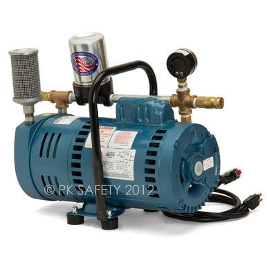 An Allegro Industries A-750 Ambient Air Pump 9821, featuring a blue industrial design with a pressure gauge, is mounted on a portable air source. It is connected to various metallic fittings and has a power cord lying beside it. The partially visible label indicates its Allegro Ambient Air Pump capabilities.