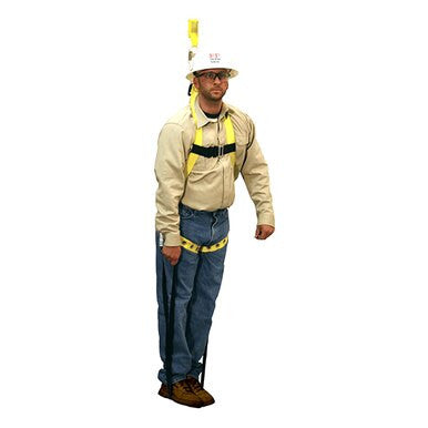 A man wearing a hard hat and safety glasses is dressed in a beige shirt, blue jeans, and brown shoes. Secured with the French Creek U-STEP Suspension Trauma Straps (Pair) from PK Safety Supply, he emphasizes fall prevention as he is attached to an overhead safety system.