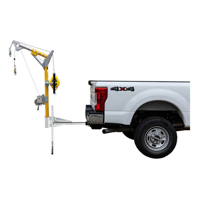 A yellow and silver French Creek Production Truck Hitch-Mount Davit Base PD10 is mounted on a white pickup, enabling heavy lifting with a winch and pulley—ideal for confined space retrieval applications.