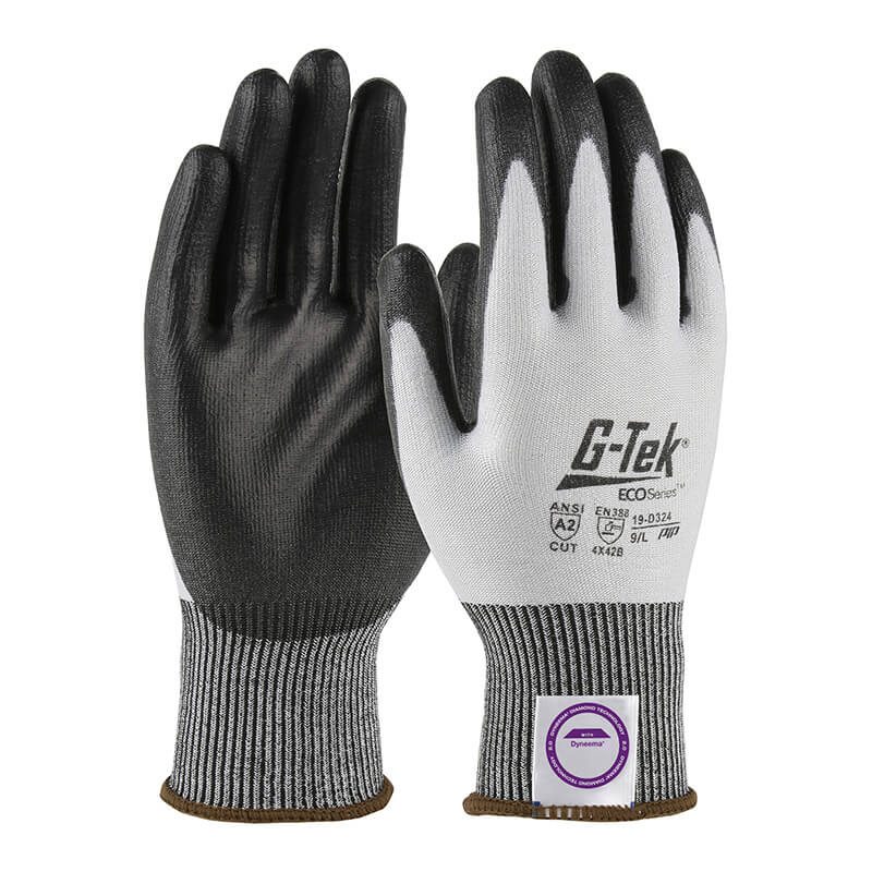 Displayed are the G-Tek 3GX Dyneema White Gloves 19-D324 by PIP - Protective Industrial Products, featuring a polyurethane-coated palm for enhanced grip. These gloves have black palms and fingers, a gray back with an elastic cuff, and incorporate Dyneema Diamond Technology for increased cut resistance. The brand logo and safety ratings are printed on the back.