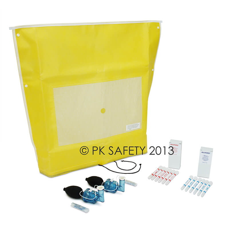 The Allegro Bitrex Respirator Fit Test Kit 2041 by Allegro includes a yellow pouch, two black masks with blue valves, small ampoules for fit testing, and two boxes of extra medical supplies.
