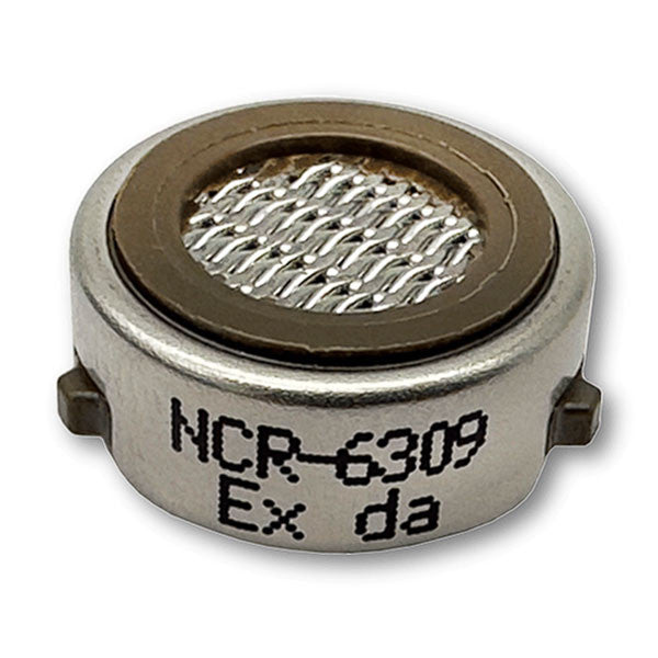 Close-up of a small, circular RKI Replacement LEL Sensor NCR-6309. This sensor is labeled "NCR-6309 Ex da" and features a metal mesh grid on top and a metallic casing with engraved text, making it ideal for use in GX-3R Pro gas monitors.
