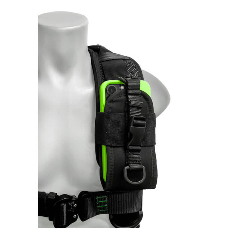 A mannequin wears the Frontline Fall Protection Frontline Elite Harness Aluminum HW & Trauma Straps, featuring aluminum hardware and a shoulder strap pocket securely holding a green smartphone.