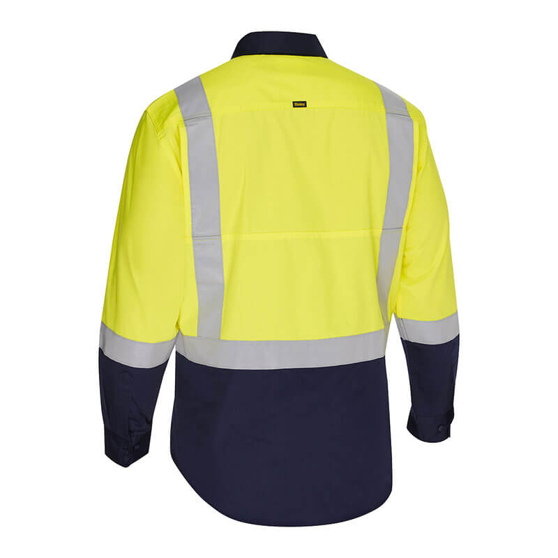 The PIP Bisley Vented Work Shirt w/Navy Bottom 312M6367H by PIP is a durable, moisture-wicking hi-visibility safety shirt with long sleeves. It has a bright yellow upper with reflective tape and a navy blue lower half and cuffs, shown from the back.