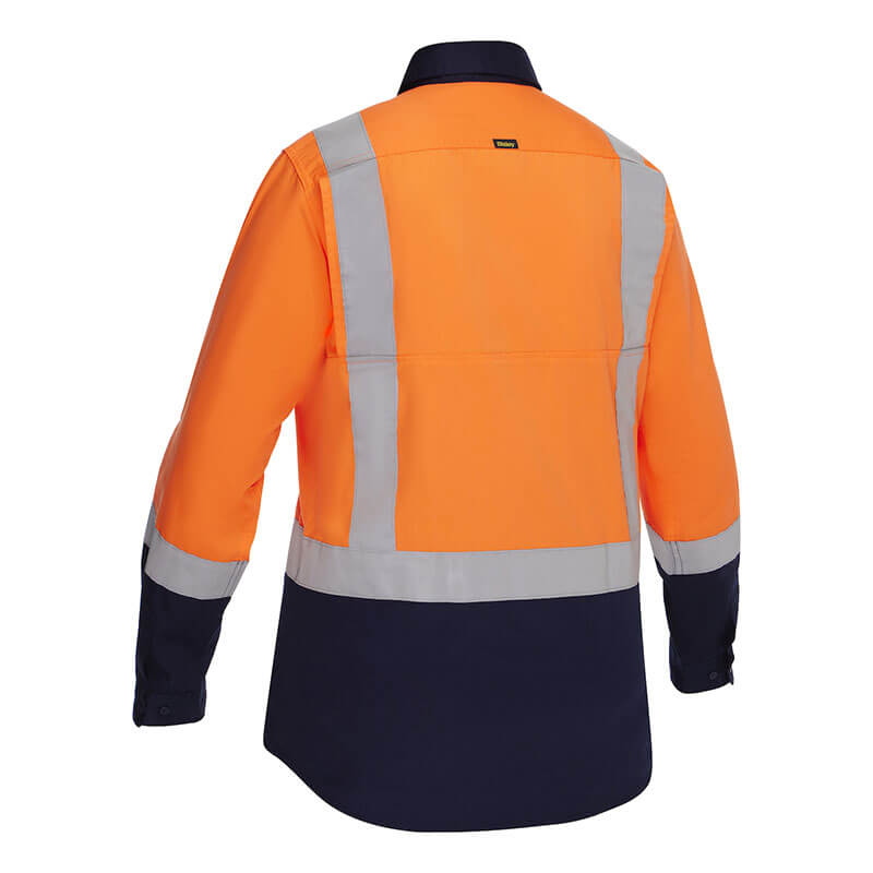 The PIP Bisley Women's Vented Work Shirt w/Navy Bottom 312W6367H features an orange top, navy bottom, and silver reflective stripes. ANSI Type R Class 2 compliant for safety and comfort. Brand: PIP.