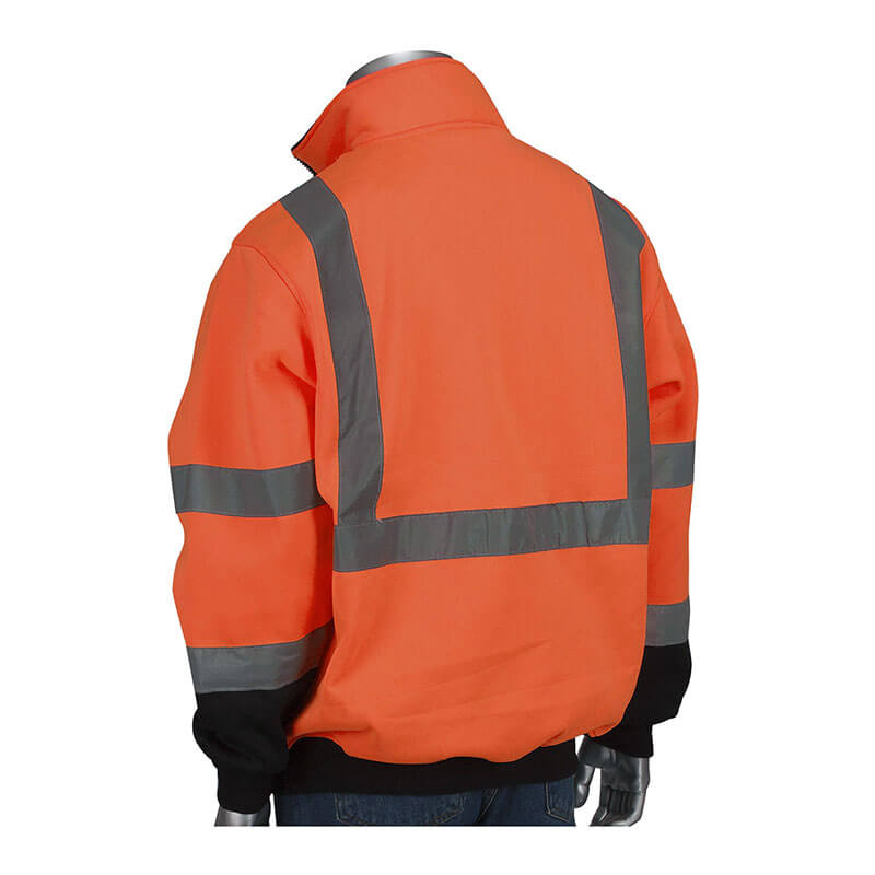 A mannequin displays the PIP ANSI Type R Class 3 Quarter-Zip Pullover Sweatshirt, a vibrant orange safety garment featuring reflective silver stripes across the back and arms, black cuffs, and a high collar. This piece of protective gear from PIP - Protective Industrial Products is showcased against a white background.