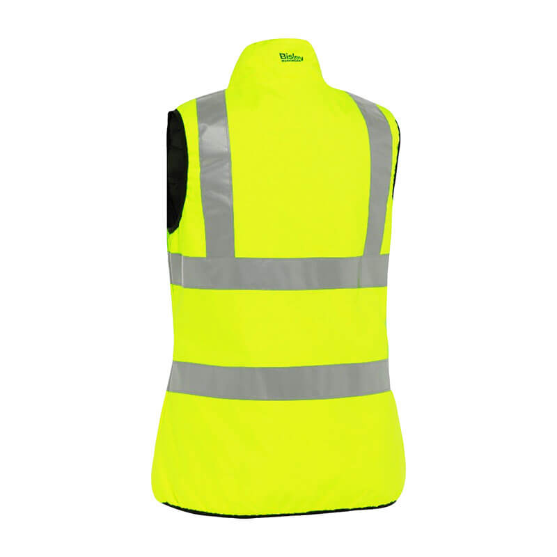 The PIP Bisley ANSI Type R Class 2 Women's Reversible Puffer Vest by Protective Industrial Products is a sleeveless, bright yellow high-visibility safety vest featuring silver reflective stripes on the back. It is designed to enhance visibility and provide 50+ UPF sun protection, while its high collar offers added protection.