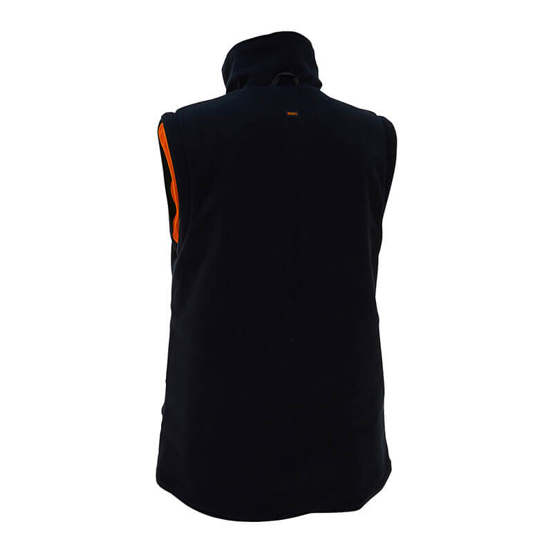 The reverse side of the PIP Bisley Women's 5-in-1 Jacket w/Navy Bottom, showcasing a black sleeveless design with an orange stripe along the armhole, evokes a chic women's jacket style, set against a white background.