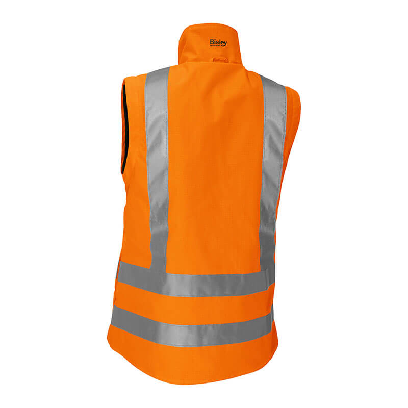 A vibrant orange high-visibility jacket with reflective silver stripes on the back, displayed against a white background. This sleeveless vest, which is equipped with a collar, meets the ANSI Type R Class 3 standards and is from the PIP - Protective Industrial Products brand's Bisley Women's 5-in-1 Jacket line featuring a navy bottom.