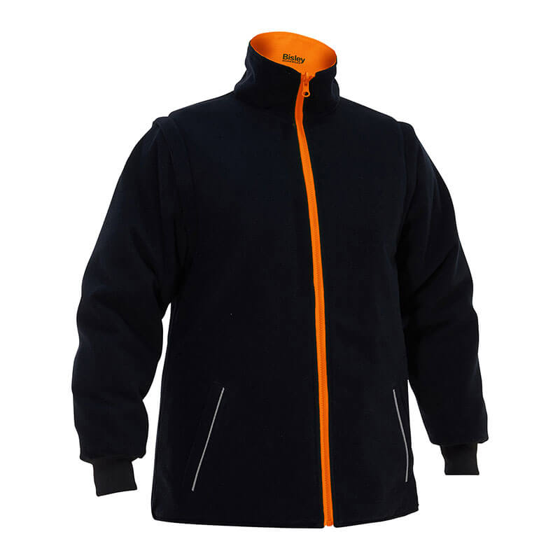 Introducing the PIP Bisley Women's 5-in-1 Jacket w/Navy Bottom by Protective Industrial Products. This jacket features a high collar and a sleek design, highlighted by an orange zipper and lining. It comes with long sleeves, two front pockets with discreet piping, and is fitted at the wrists for both style and functionality. Perfect as a high-visibility jacket, it offers practicality while ensuring you look great.