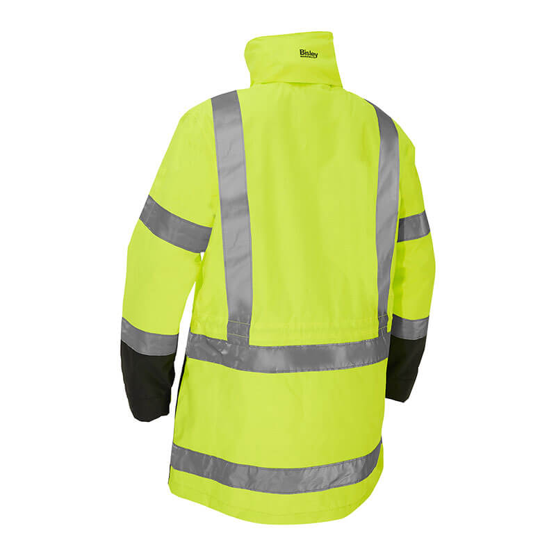 This high-visibility PIP Bisley Women's 5-in-1 Jacket with a Navy Bottom in bright yellow features reflective silver stripes and black cuffs. From the back, it highlights a high collar and long sleeves, meeting ANSI Type R Class 3 standards for maximum safety.