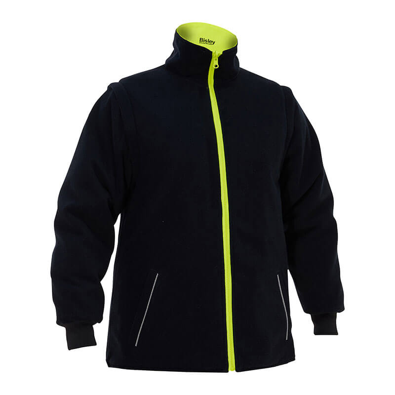 Introducing the PIP Bisley Women's 5-in-1 Jacket with Navy Bottom by Protective Industrial Products. This jacket combines style and safety, featuring a black fleece exterior with a high collar and an eye-catching bright yellow zipper. Designed for visibility, it includes two angled side pockets accented in yellow and ribbed cuffs for added comfort. The inside of the collar also boasts a yellow detail, ensuring you remain both cozy and noticeable.