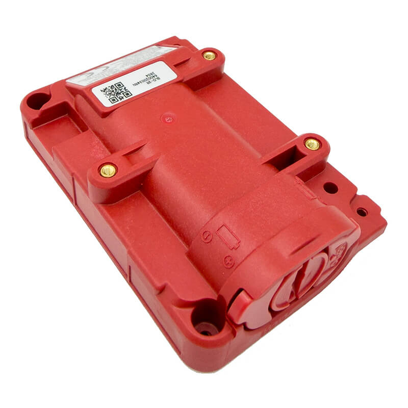 A red rectangular electronic device with a cylindrical component, four gold screws, and QR/barcode labels on top, the RKI Instruments Alkaline Battery Pack for GX-3R Pro (49-1626) is compatible with portable gas monitors such as the RKI GX-3R Pro and delivers reliable performance.