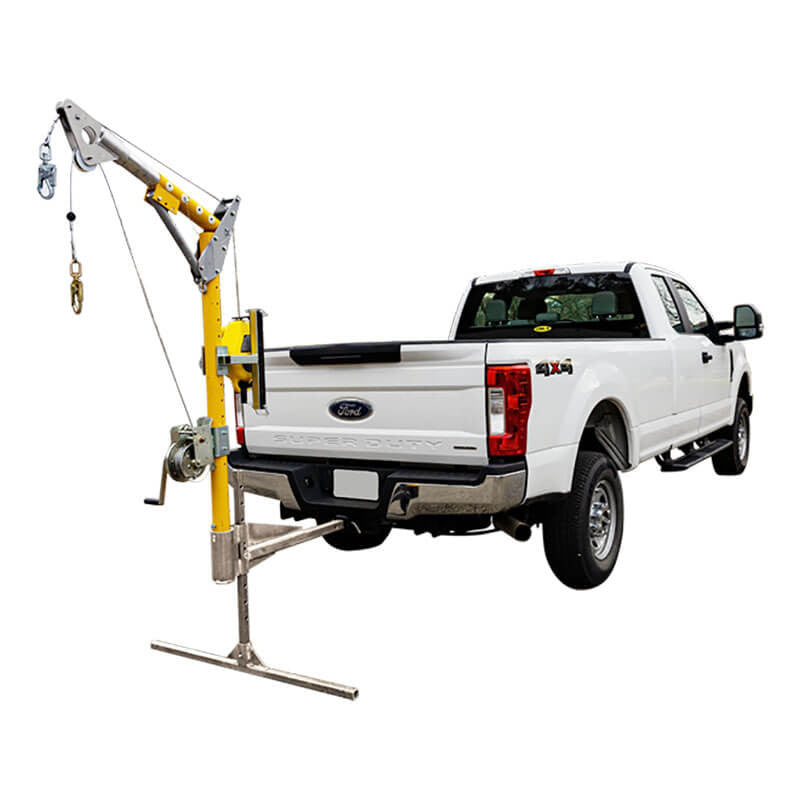 A white pickup truck with a mounted yellow and silver French Creek Production Truck Hitch-Mount Davit Base PD10 crane, designed for lifting and loading heavy objects. The crane extends past the tailgate with a hook and winch system.