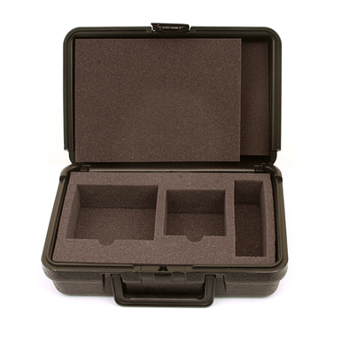 The RKI Instruments Padded Carrying Case 20-0115RK-01, by RKI Instruments, features foam inserts with three rectangular compartments to securely hold your GX-2009 gas detector accessories. The dark foam contrasts with the lighter interior for optimal protection and organization.