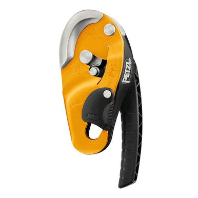 Close-up of a Petzl RIG Compact Self-Braking Descender D021AA00 in orange and black, showcasing its sleek, ergonomic design. This device from Petzl features a prominent ergonomic handle and an efficient locking mechanism, ideal for rope access enthusiasts.
