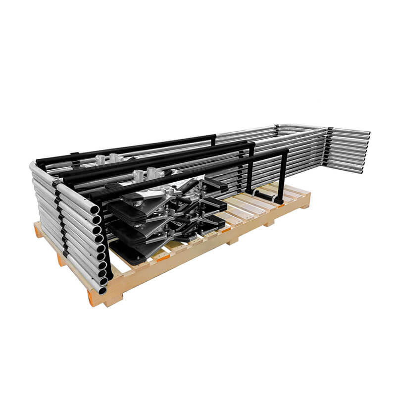 Galvanized metal pipes and frame parts for the Frontline Guardrail System Non-Penetrating Complete 100' Kit by Frontline Fall Protection are neatly arranged on a pallet, displaying this fall prevention solution against a white background.