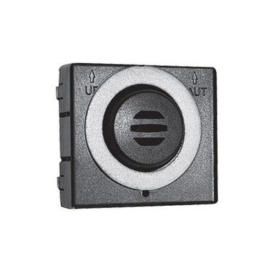 A square black button from Honeywell Analytics, similar to those seen on the E3Point Nitrogen Dioxide Sensor Cartridge (E3NO2), showcases a centered circular element with horizontal lines. The top edge is labeled with arrows indicating "UP" and "OUT," while a small circle is positioned at the bottom center, all set against a crisp white background.