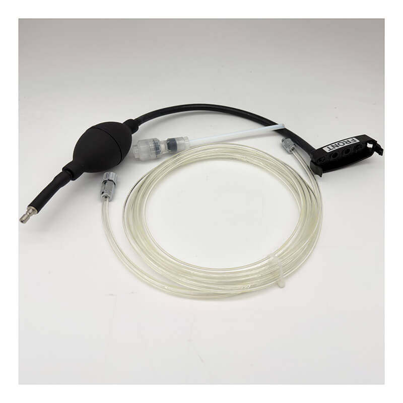 The RKI Instruments GX-3R Pro Hand Aspirated Sample Adapter (81-1162) features clear tubing with connectors, a black squeeze bulb, and a compact black control unit—ideal for medical or laboratory applications such as gas detector sample adapter use or confined space gas sampling. The coiled assembly is neatly arranged in a circle and displayed on a white background.