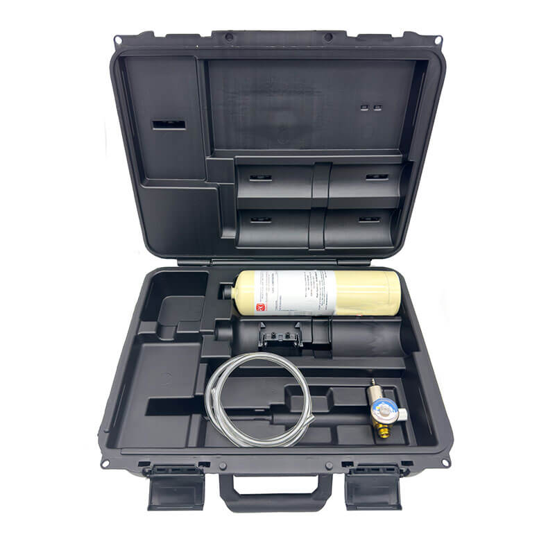A black hard plastic carrying case holds a gas cylinder, calibration gas, pressure gauge with hose, and foam compartments—ideal for storing and organizing the RKI OX-04 O2 Gas Monitor Calibration Kit 81-OX04-LV by RKI Instruments.