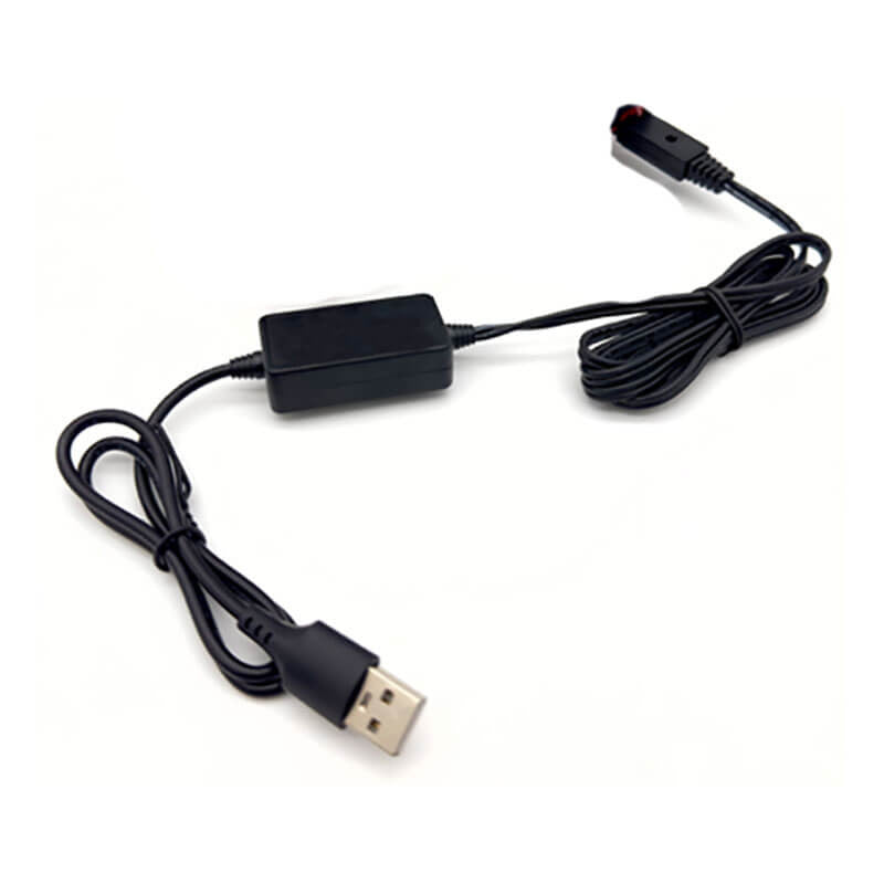 The RKI Instruments RKI GX-3R and GX-3R Pro DC adapter with USB 49-2023 is a black car cigarette lighter to USB cable with a rectangular converter, ideal for powering compatible gas monitors, shown on a white background.