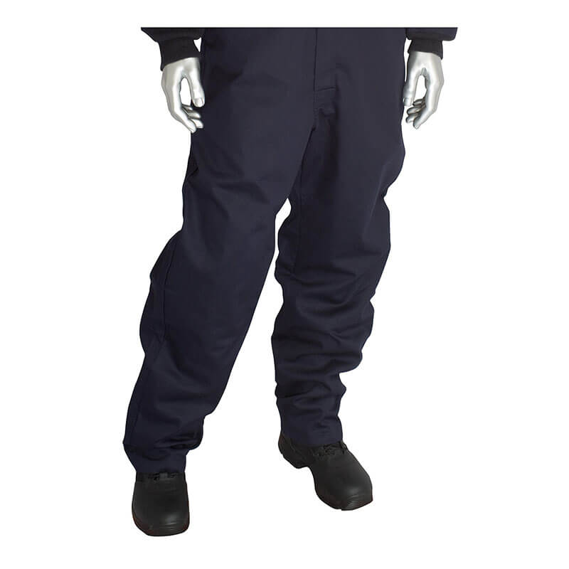 A mannequin dressed in PIP Navy 8.5 Cal Dual Certified ARC/FR Coverall 9100-2160D, black shoes, and showing silver-colored hands stands against a white background.