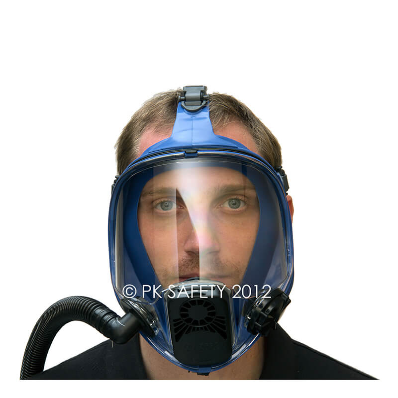 An individual is wearing the Allegro Full Face Constant-Flow Airline Respirator 9901, which includes a blue frame and clear visor. The respirator also features a black filter and hose for enhanced protection, set against a plain white background.