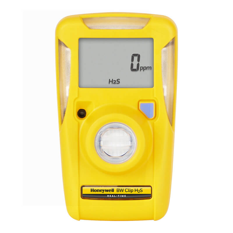 The BW Clip Real Time 2 Year H2S Detector 10-15 ppm BWC2R-H by BW Technologies, a yellow handheld device with a central round sensor and operational buttons, shows "0 ppm" for H2S on its display, indicating zero parts per million.