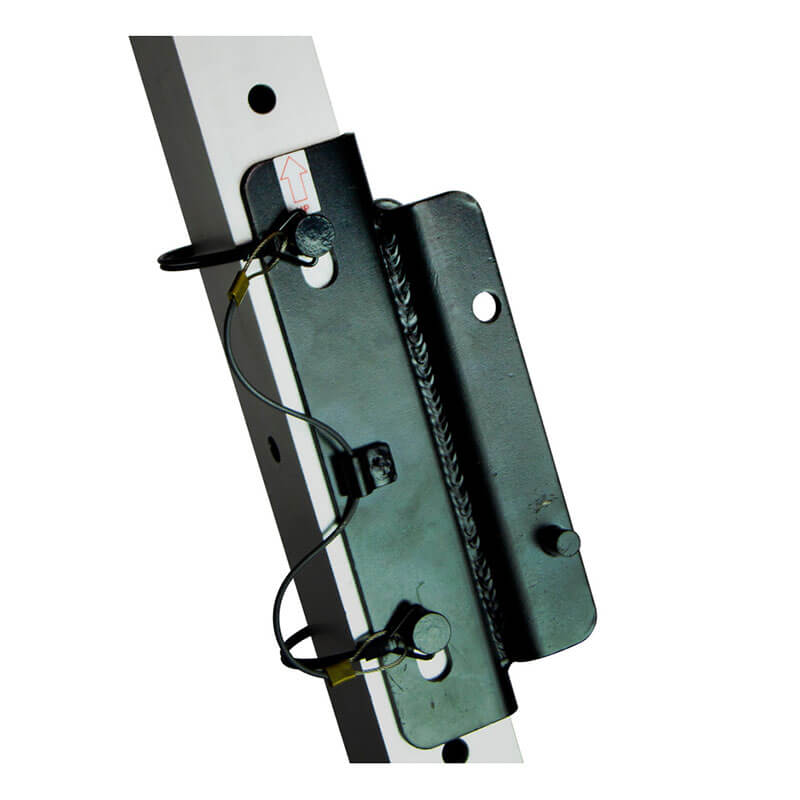 Close-up of a metal bracket with two bolts and a wire attached, mounted on the Frontline Fall Protection MEGApod Aluminum Tripod with 60' Winch, used for non-entry rescue. An upward arrow sticker is visible near the top.