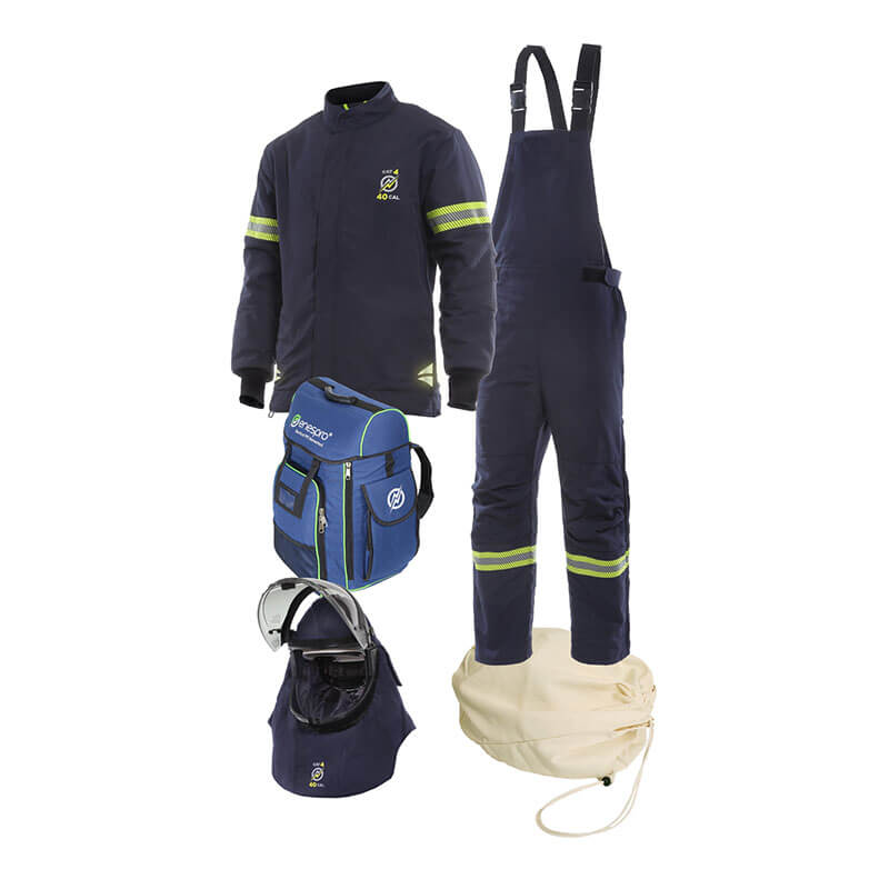 The NSA Enespro AirLite Ascend 40Cal AF Kit includes a jacket and overalls with reflective stripes in navy blue DRIFIRE fabric, a blue backpack, helmet with Lift Front Hood and face shield, plus a beige storage bag.