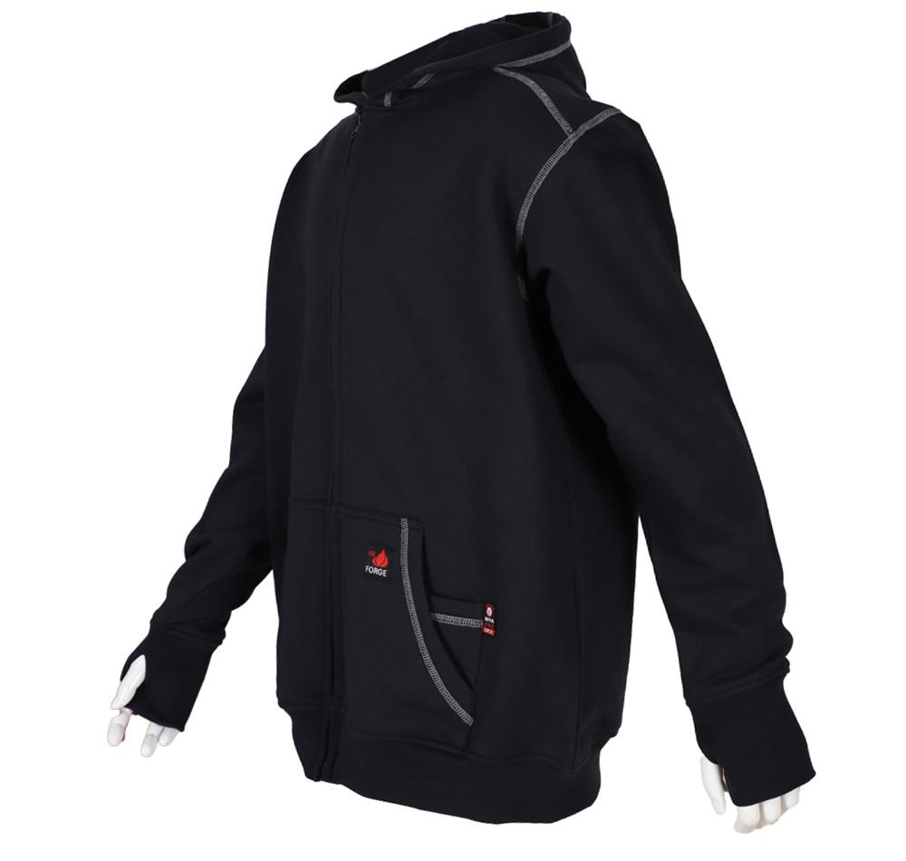 Displayed on a mannequin is the ForgeFR Men's FR Polartec Hoodie in black, featuring gray stitching details. This hoodie includes a front zipper, two pockets adorned with small red and white logo patches, and thumb holes in the cuffs. It meets NFPA 2112-2018 standards, combining style with safety for the wearer.