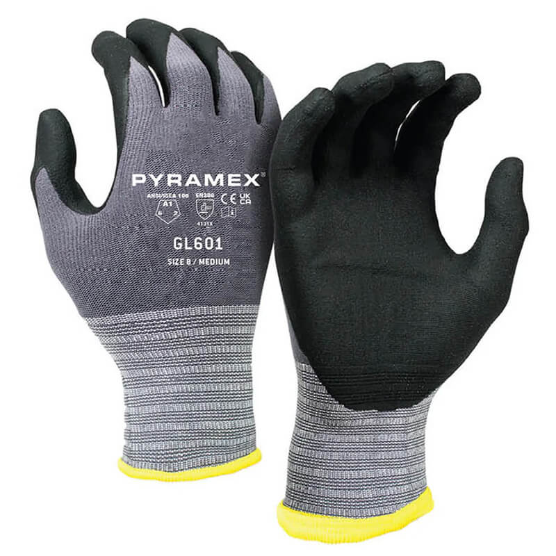 Introducing the Pyramex Corxcel Micro-Foam Nitrile Gloves GL601 from Pyramex Safety—these gray and black work gloves are designed with textured gripping palms to maximize grip. They feature a stylish yellow trim at the cuffs, along with distinctive text and logos on the back for both style and functionality.