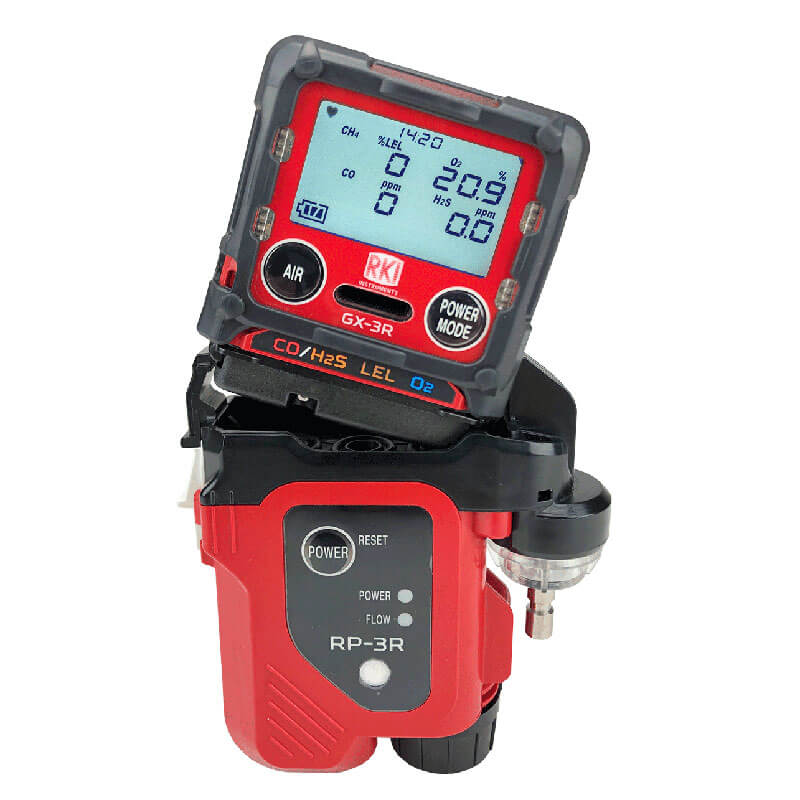 The RKI Instruments RP-3R Sample Drawing Pump for GX-3R is a portable confined space gas monitor with a digital display, featuring red and black design, multiple control buttons, and indicators for power, reset, and gas levels.