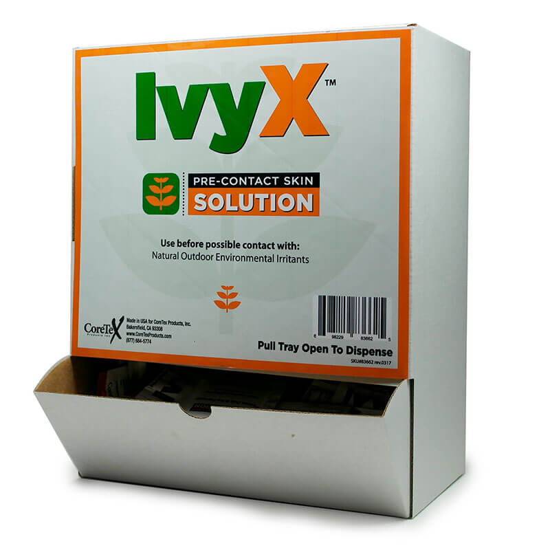 The Coretex IvyX Pre-Contact Skin Solution by PK Safety Supply provides dependable protection against natural outdoor irritants, such as poison ivy. The product's predominantly white packaging, featuring orange and green text, includes a handy dispensing slot at the bottom, highlighting its function as a barrier. It is available in a Wallmount Dispenser format with 50 units per box (Product Code: 83662).