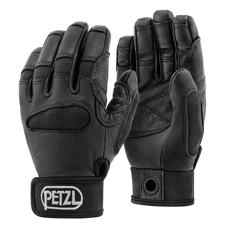 A pair of black Petzl Cordex Plus Midweight Belay and Rappel Gloves (K53) made from abrasion-resistant stretch nylon and reinforced goat leather, featuring adjustable Velcro wrist straps and PETZL logo. One glove is palm up, the other palm down.