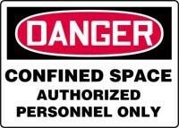 A warning sign from AccuformNMC reads "DANGER" in bold white letters on a red background. Just below, it alerts people to the presence of a confined space with the message "Accuform CONFINED SPACE AUTHORIZED PERSONNEL ONLY" in black letters on a white backdrop, emphasizing the need for essential safety equipment.