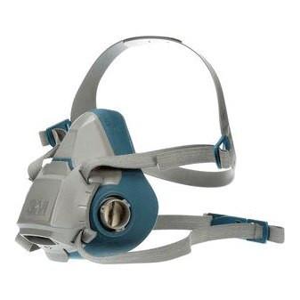 The 3M Half Facepiece Reusable Respirator 6500 Series by 3M is a gray and blue respirator designed with adjustable straps for a snug fit. It includes two side filter vents and a central nose piece, and is compatible with 3M cartridges to provide enhanced respiratory protection.
