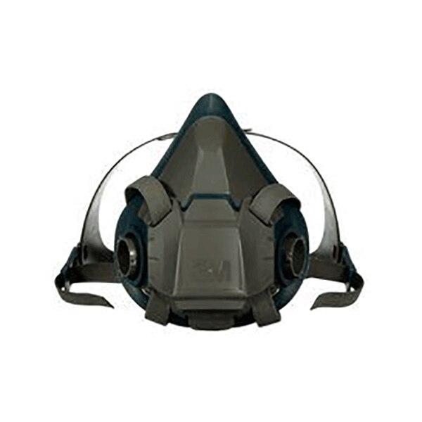 A close-up of the 3M Half Facepiece Reusable Respirator 6500 Series reveals its dark gray and black design, adjustable straps, and dual filtration units that are compatible with 3M cartridges, providing enhanced respiratory protection on each side.