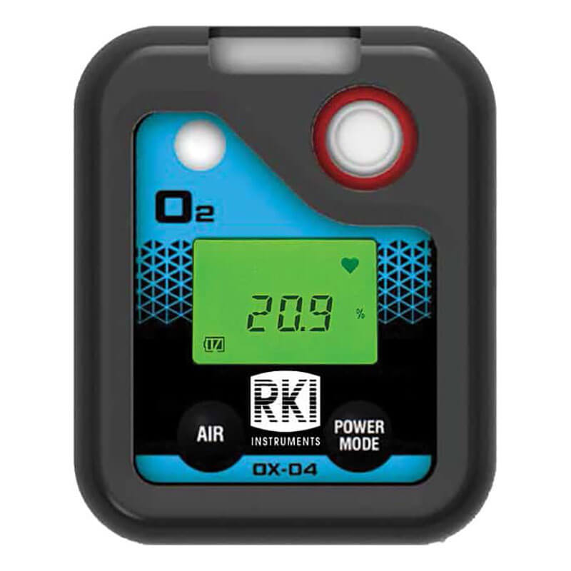 The RKI Instruments OX-04 Series O2 Single Gas Monitor (72-0018) displays "20.9%" for oxygen on its green screen, features "AIR" and "POWER MODE" buttons, and is clearly marked with the RKI Instruments brand.