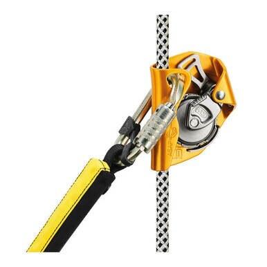 A Petzl RAY 11 mm with sewn termination, featuring a yellow climbing pulley device complete with a carabiner and a mechanical component for precise maneuvering, is attached to a black-and-white low stretch rope. This setup is ideal for rock climbing or rescue operations and meets the ANSI Z359.15 standard for enhanced safety.