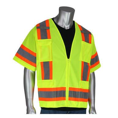A silver mannequin showcases the PIP Lime Yellow Two Tone Surveyor 11 Pocket Vest Class 3 in bright lime yellow with orange and reflective gray stripes, worn over a black shirt. This ANSI Class 3 vest features two large pockets on the front. The mannequin stands against a plain white background, emphasizing the vest's striking design.