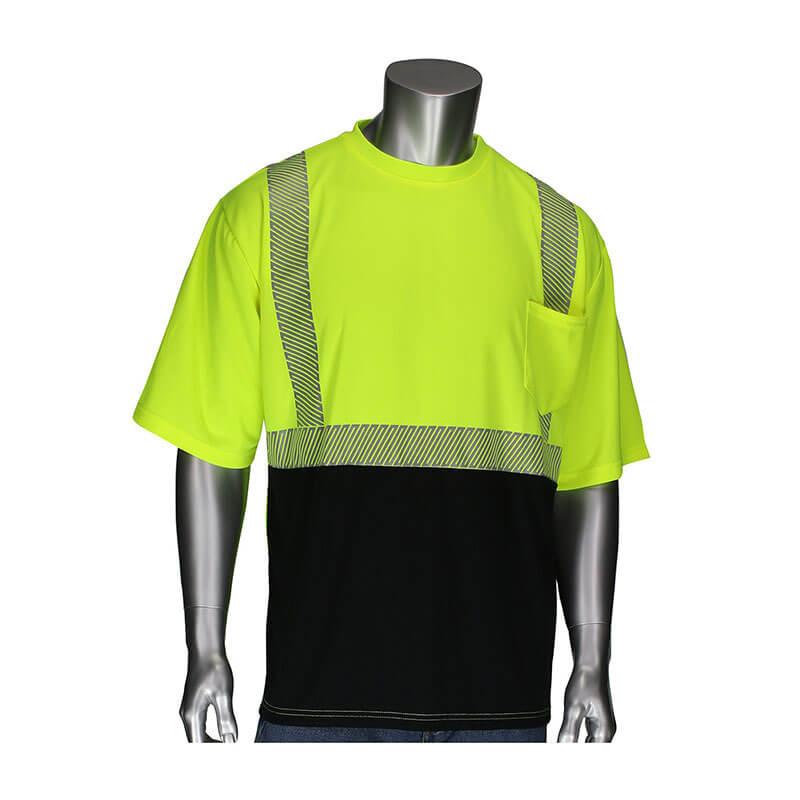 A display mannequin models the PIP ANSI Type R Class 2 Black Bottom Front Short Sleeve shirt from Protective Industrial Products, designed in fluorescent yellow with segmented reflective tape and a small chest pocket. It's complemented by black pants, creating ideal hi-visibility apparel for safety.