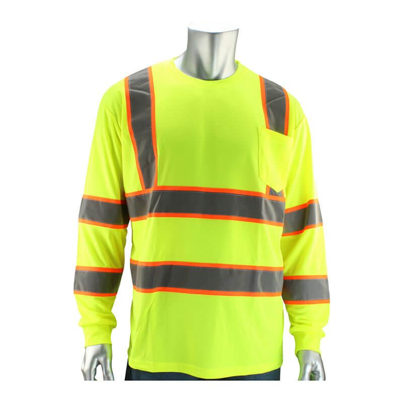 A mannequin showcases the PIP Type R Class 3 Two-Tone Long Sleeve t-shirt from PIP - Protective Industrial Products, featuring a vibrant yellow color made from polyester birdseye mesh. This hi-visibility apparel is adorned with reflective gray and orange stripes across the chest, arms, and back, and includes a practical chest pocket on the left side.