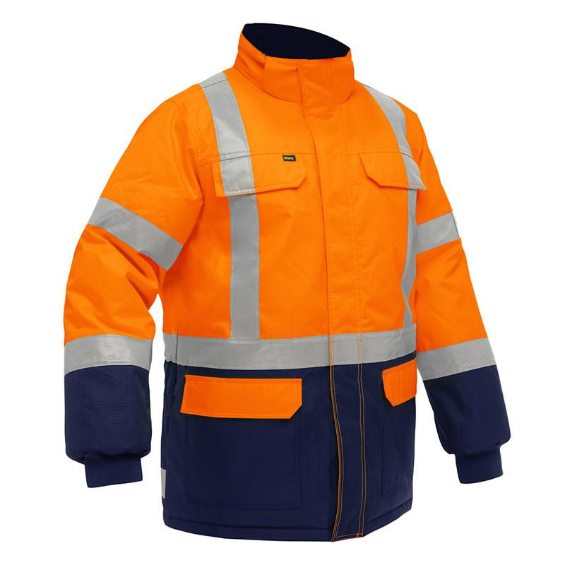 The PIP Bisley X-Back Extreme Cold Jacket w/Navy Bottom 343M6450X features bright orange and navy panels, reflective silver stripes, flap chest pockets, and a front zipper—ideal high-visibility thermal protection for extreme cold.
