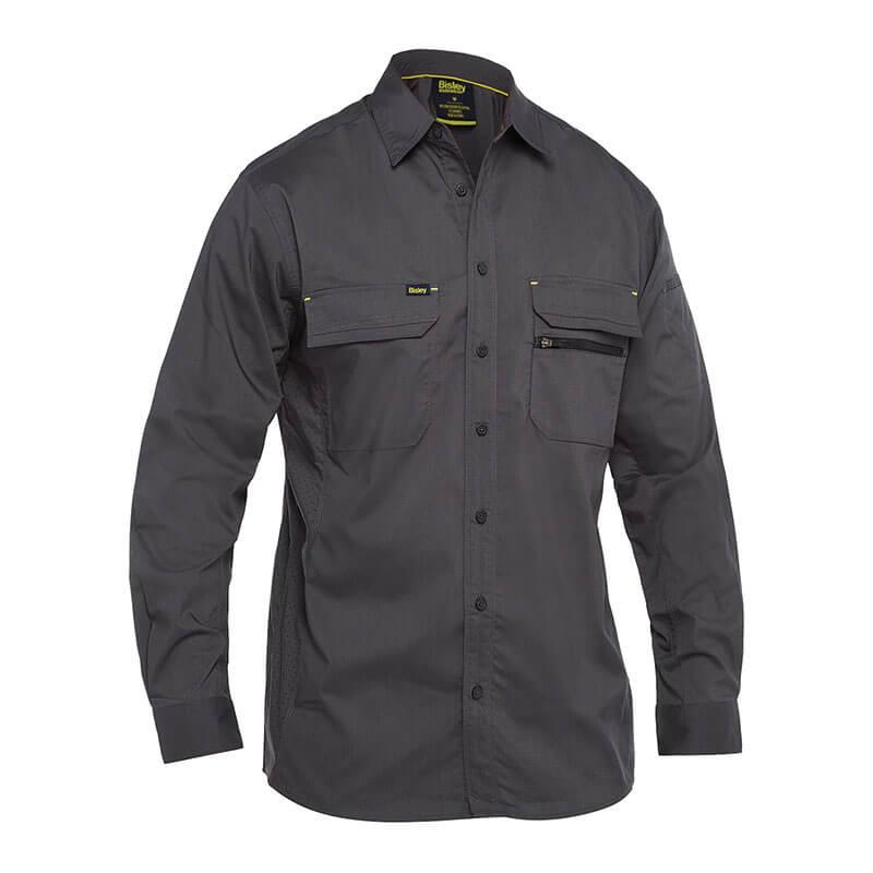 PIP Bisley Ripstop Work Shirt by PIP – Protective Industrial Products showcases a dark gray design with a button-up front, two chest pockets, and a pointed collar. With X-Airflow Ventilation, this work shirt combines durable fabric with enhanced comfort ideal for outdoor or industrial settings.