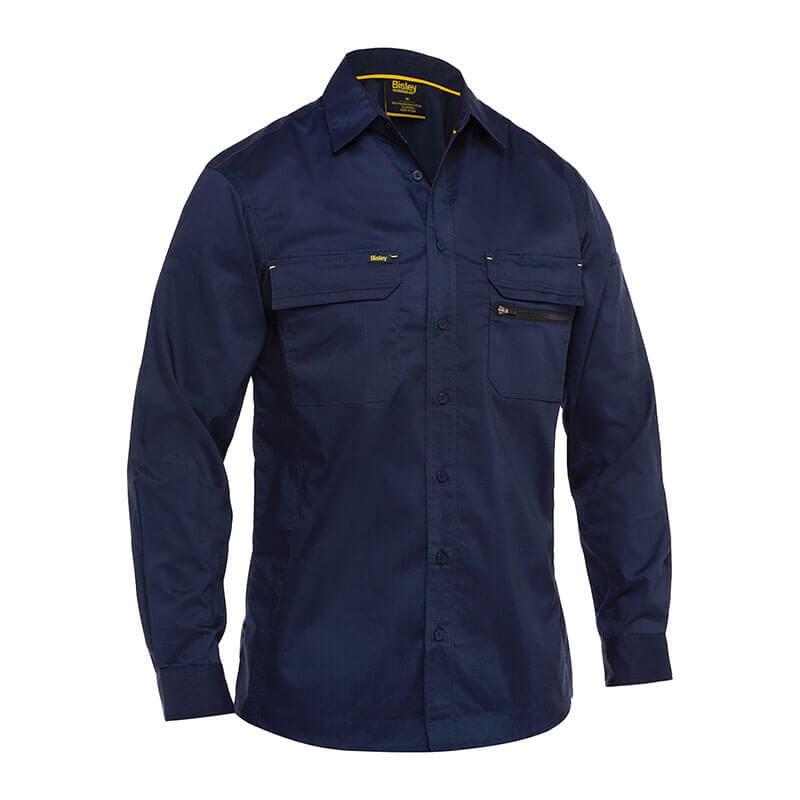 The PIP - Protective Industrial Products Bisley Ripstop Work Shirt w/X-Airflow is a navy blue button-up shirt that comes with long sleeves, two chest pockets, and a collar. It offers a relaxed fit and includes X-Airflow Ventilation, making it ideal for casual or work environments.