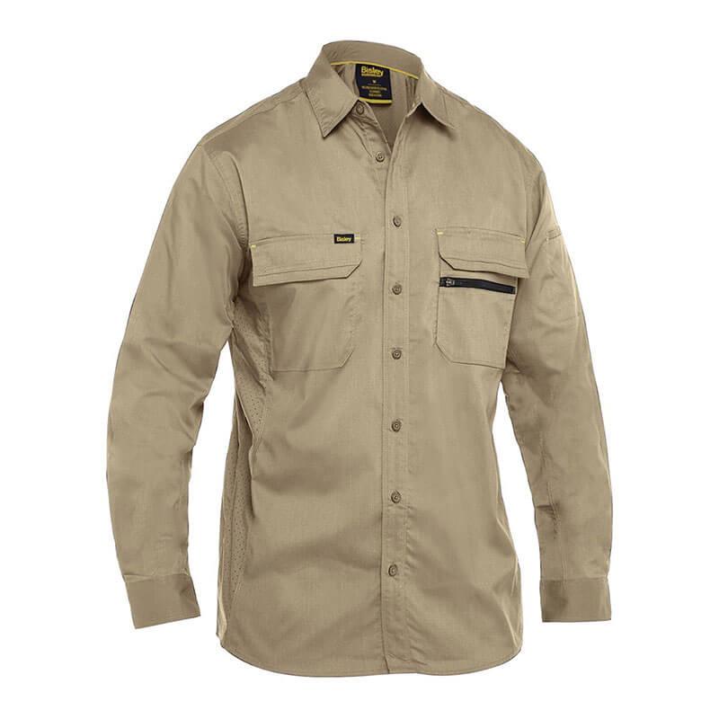 The PIP Bisley Ripstop Work Shirt w/X-Airflow by Protective Industrial Products comes in a khaki color and features long sleeves with two chest pockets, one adorned with a black zipper detail. Its classic collar and relaxed fit make the shirt perfect for both casual outings and workwear, while the UPF 50+ protection ensures you remain safe under the sun.