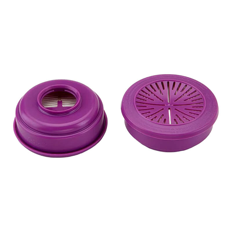 Two round purple plastic PIP North N-Series P100 Particulate Filters, inspired by respirator mask technology, feature slotted lids and circular openings—ideal for draining and microwaving foods like pasta or vegetables.