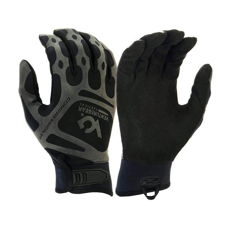 The Pyramex Compression Fit Training Gloves by Pyramex Safety come in black and gray with Velcro straps. They feature a durable, textured design and provide a secure, snug fit. Displayed with one glove showing the palm up and the other palm down, they highlight the grip, ventilation features, and touchscreen compatibility for versatile functionality.